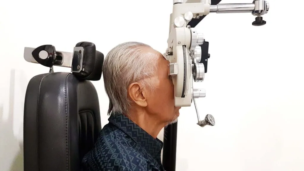 Eye specialist checking an early cataract during an eye exam