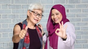 Singaporean women giving a thumbs up after choosing a cataract surgeon